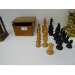 Jaques and Son; a Staunton chess set in original oak box with label; damage to black castle