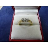 18ct yellow gold ring set with 3 diamonds, size O, marked total item weight 3.4g