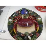 Two Palissy style circular plates decorated lobster and crab, each 33 cms