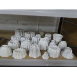 A collection of Shelley porcelain jelly moulds - 21