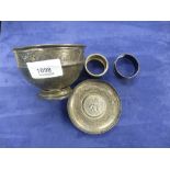 A selection of silver items all hallmarked including a bowl, dish and two napkin rings gross