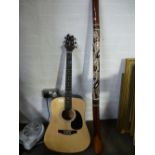 A Stagg acoustic guitar and a Didgeridoo