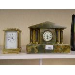 A small onyx mantel clock having 8 day movement and a Worcester carriage clock