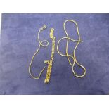 9ct yellow gold neckchain stamped 375, 9ct yellow gold bracelet A/F, and one other yellow coloured