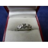 18ct gold two tone dress ring set with 3 illusion set diamonds in heart shaped mounts, size K/L,