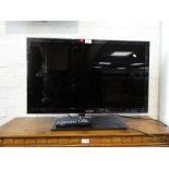 A Samsung 32 inch television on swivel base