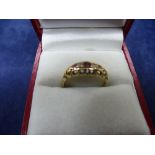 9ct yellow gold dress ring set with diamonds and pink stones, size N, total weight 1.8g
