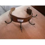 An old leather collar having brass hooks, possibly Campaign