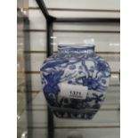 A Chinese blue and white vase of square form decorated birds, 12.5 cms