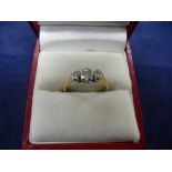 18ct and Platinum set with 3 diamonds, size L/M, total gross weight 2g