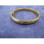9ct yellow gold bangle, marked 375 total weight 9g