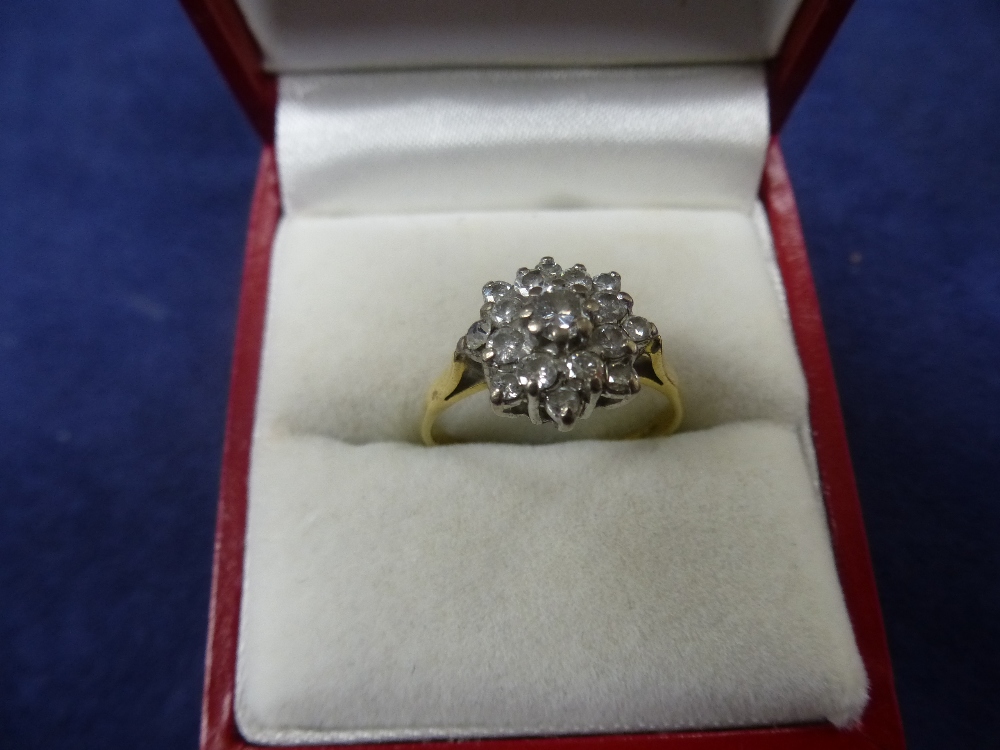 18ct yellow gold diamond cluster ring size O, total weight 3.1g, marked 750
