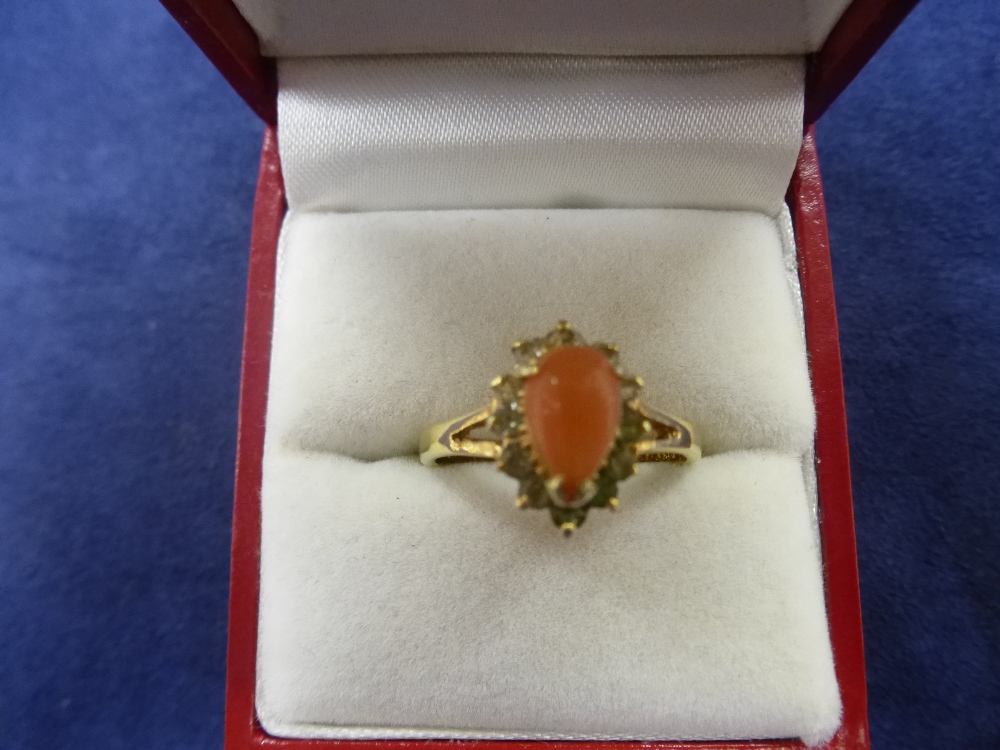 18K yellow gold dress ring set with tear shaped coral stone and surrounded by clear stones, size P/Q - Image 2 of 2