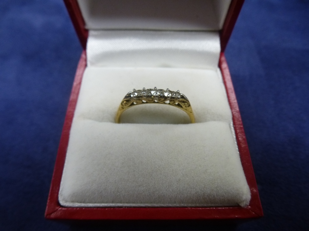 Yellow metal 5 stone diamond ring, size S/T, total item weight approx 2.1g