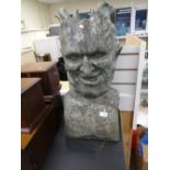 A terracotta painted bust of Devilish man