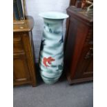 A modern Chinese floorstanding vase decorated Carp and flowers, 93 cms
