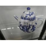 A small Chinese blue and white teapot having floral decoration