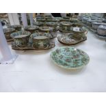 A set of 6 20th Century Chinese rice bowls with covers, Eleven Canton style cups and saucers, eleven