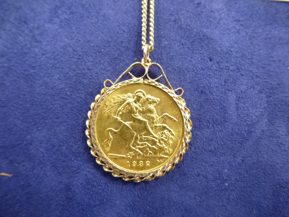 9ct yellow gold neckchain marked 9K, weight approx 4.5g with a full Sovereign pendant dated 1932, in