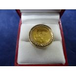 Ladies 9ct yellow gold ring marked 375, inset with 1/10 Krugerrand dated 1984, total weight 6.6g