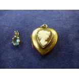 9ct heart shaped locket inset with a cameo, marked 9ct together with a yellow metal pendant inset