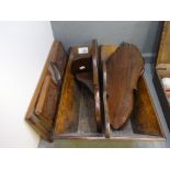 An antique oak cutlery tray, a carved book trough and two mahogany wall brackets