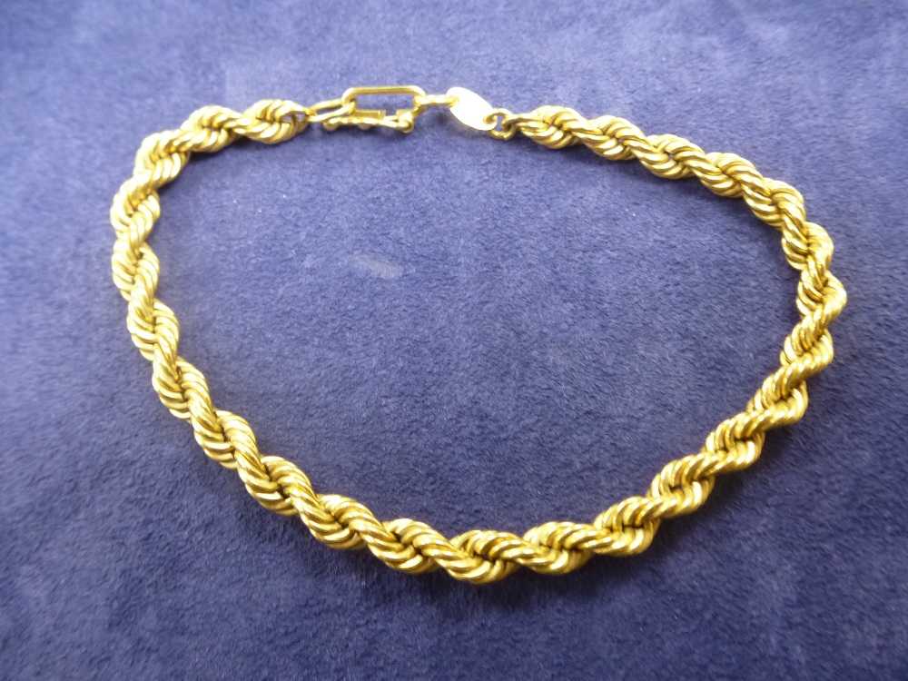 Ladies rope twist design bracelet, marked 750, weight 6.9g
