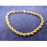 Ladies rope twist design bracelet, marked 750, weight 6.9g