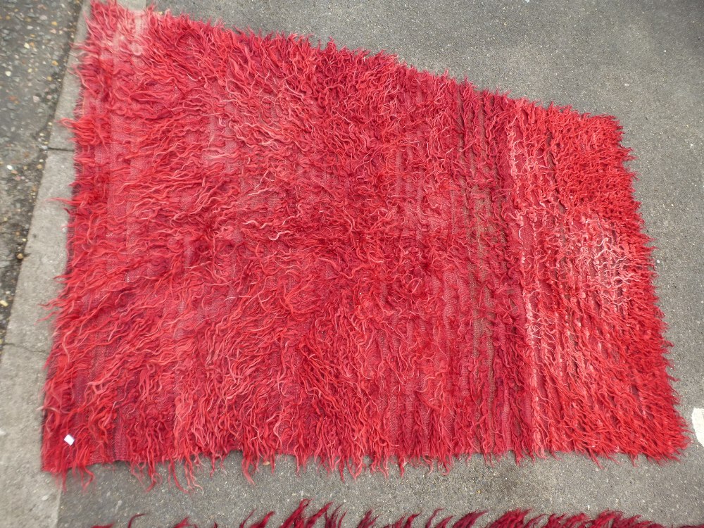 A Turkish Tulu rug having green central stripe and one other red Tulu rug, the largest, 224 x 130cms - Image 2 of 2