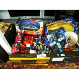 Two trays of boxed and unboxed toy cars to include a Corgi Batmobile and a Corgi set of four James