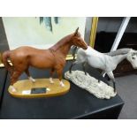 A Beswick model of 'The Minstrel' Racehorse of the Year, 1977 and a Beswick grey dapple horse -