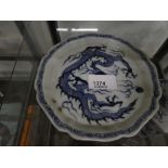 A Chinese blue and white dish decorated dragon, 16 cms