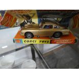 A Corgi James Bond DB5 with gold livery, boxed