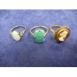 Two 9ct rose gold rings, one set with green coloured stone, gross 6.7g, and an opal ring on a