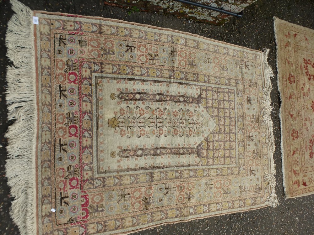 A Turkish style prayer rug, having stylised design, 157 x 116 cms