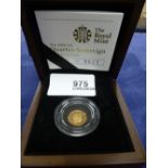 Boxed quarter Sovereign gold proof coin, dated 2009 and Certificate of Authenticity