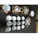 A quantity of Royal Crown Derby teaware including a moustache cup and saucer