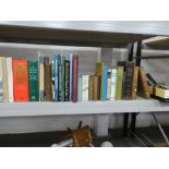 A shelf of assorted books