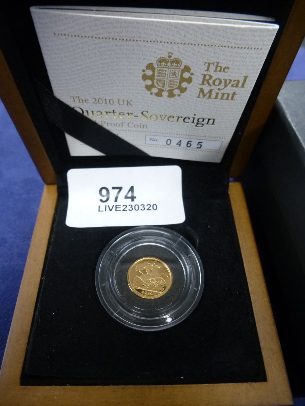 Boxed quarter Sovereign gold proof coin, dated 2010 with Certificate of Authenticity