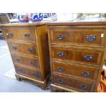 A pair of reproduction Yew bedside chests each having four drawers