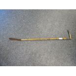 A late 19th Century bamboo riding whip by Waine and Co., London, the silver mount marked Cyprus,