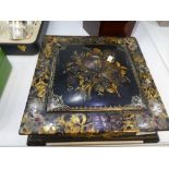 A Victorian papier mache card box with fitted interior having gilt and Mother of Pearl floral