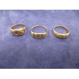 Three rings, 9ct - AF, 18ct AF and yellow metal