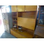 Large Mid century teak wall unit with cupboards, open shelves and drop down compartment above