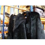 Black fur coat and faux mink example