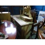 Stripped pine dressing chest with mirror above 2 mini and 3 long drawers on bracket supports