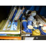 A quantity of hard back books, a box of china to include mugs, jugs, etc.