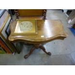 A Victorian burr walnut fold over card table with carved quadropod base, 96 cms