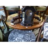 A Victorian Burr walnut oval loo table on carved decorative base, 150cms