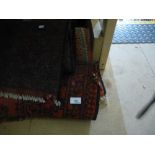 4 Various Middle Eastern style carpets of various colours and sizes